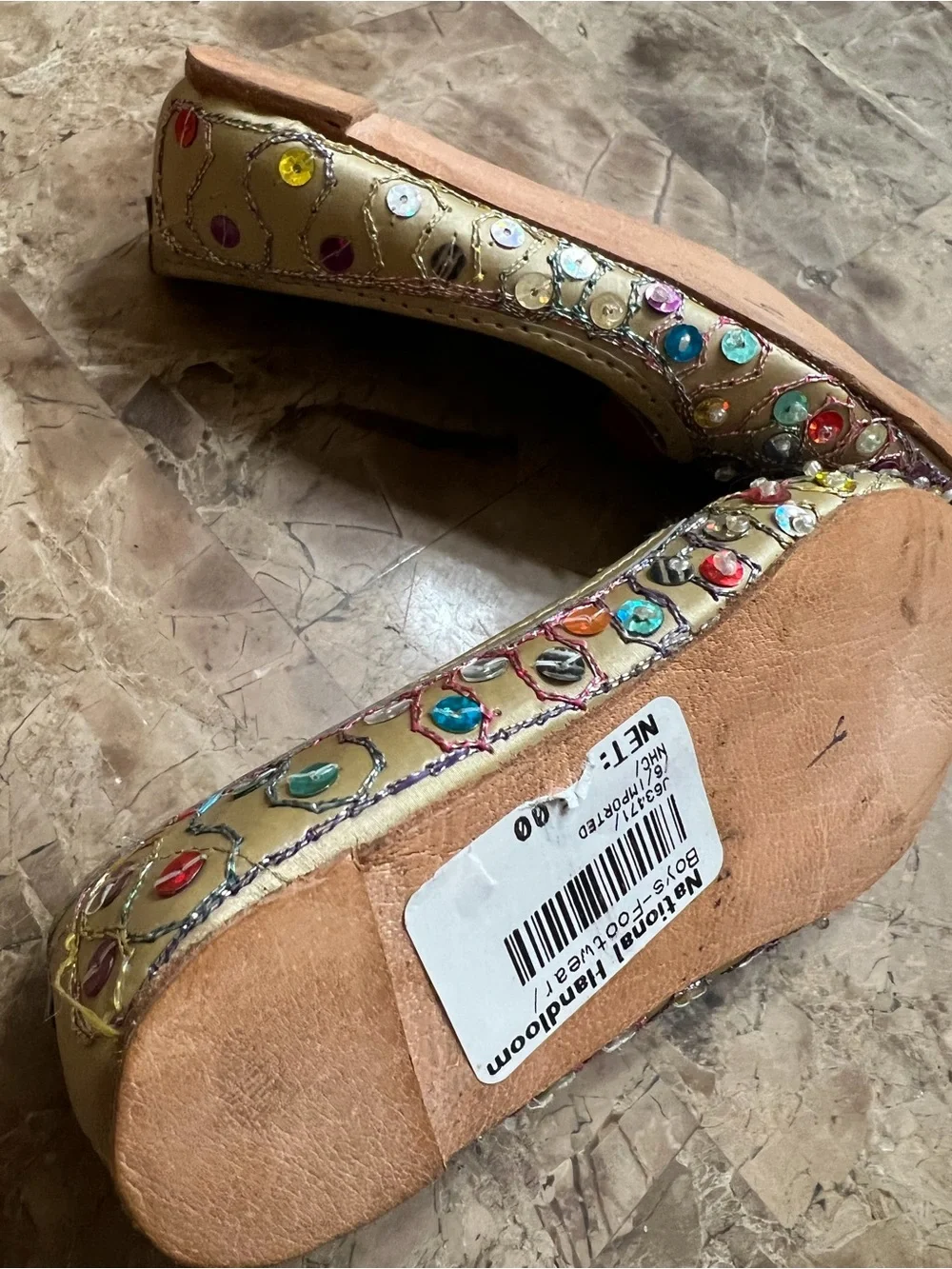 Embellished Gold kid Flats with Red Pom-Pom